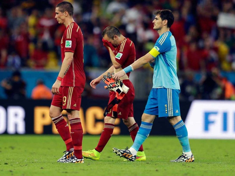 Tây Ban Nha rời World Cup 2014 sớm hơn dự kiến. Ảnh: BBC.