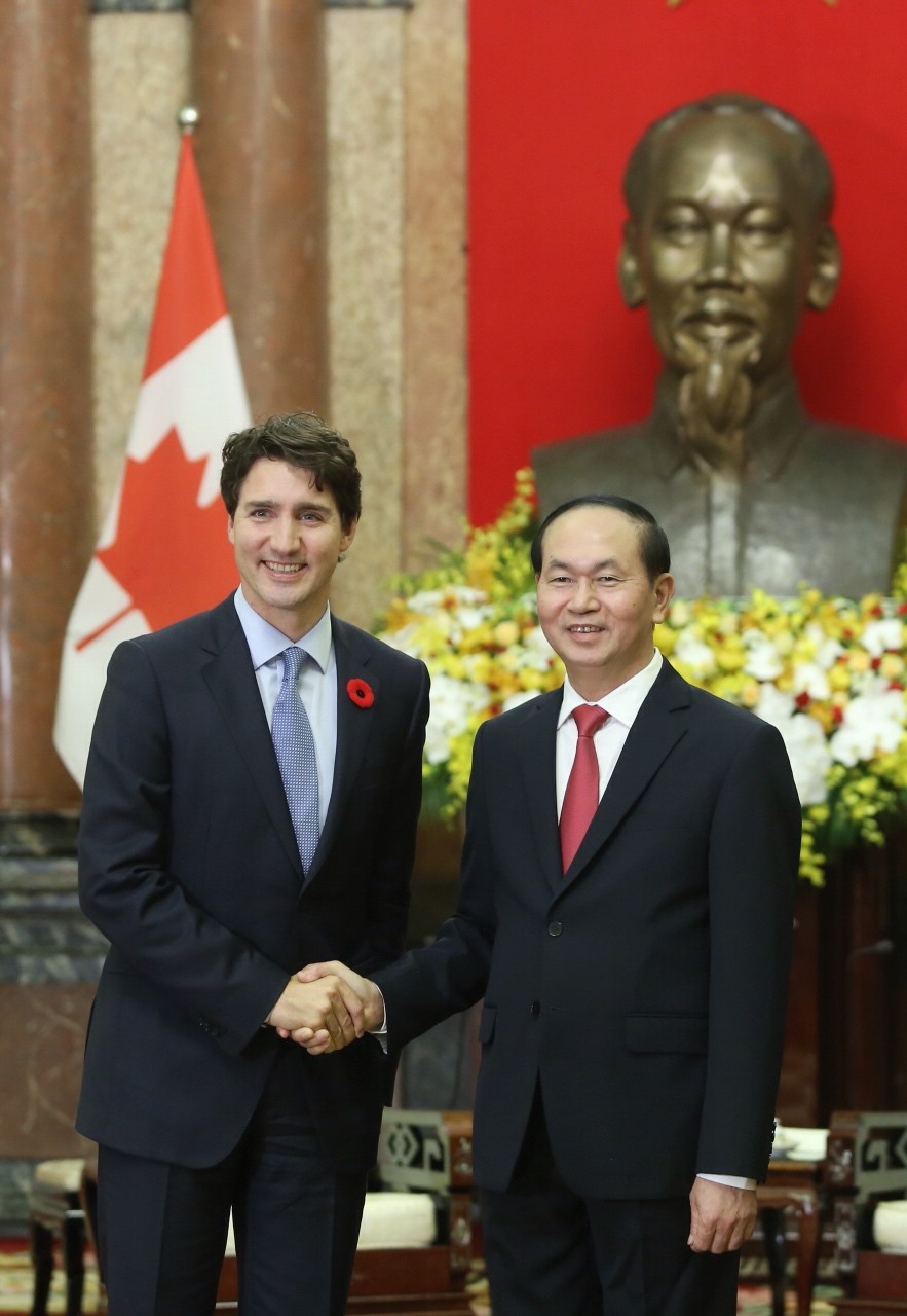 Chủ tịch Nước Trần Đại Quang và Thủ tướng Canada Justin Trudeau. Ảnh: PV