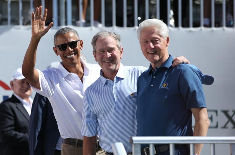 Ba cựu Tổng thống Mỹ tham gia giải golf Presidents Cup. Ảnh: Reuters