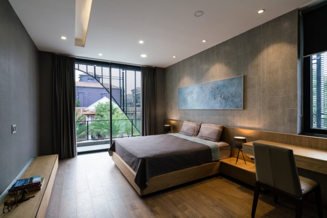Một phòng ngủ có thiết kế khá đơn giản với tông màu sáng, giống như mọi ngôi nhà tại Việt Nam.