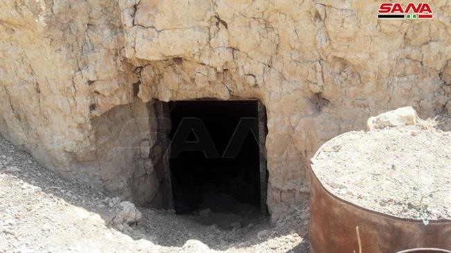 Đường hầm từng được phiến quân sử dụng được tìm thấy ở ngoại ô làng Hasraya. Ảnh: SANA.