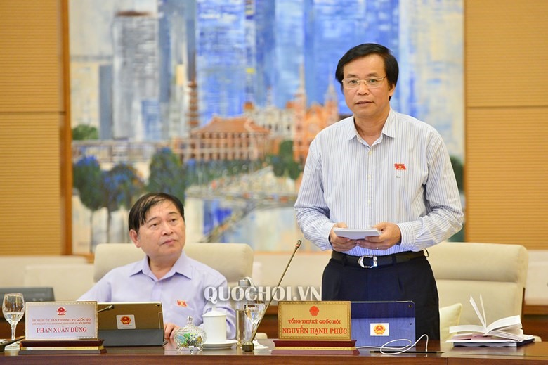 Tổng Thư ký Quốc hội Nguyễn Hạnh Phúc phát biểu tại phiên họp. Ảnh Quochoi.vn