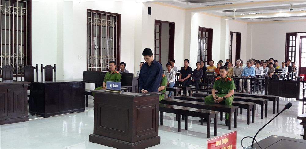 Đối tượng Nguyễn Minh Thạnh tại tòa. Ảnh: P.V