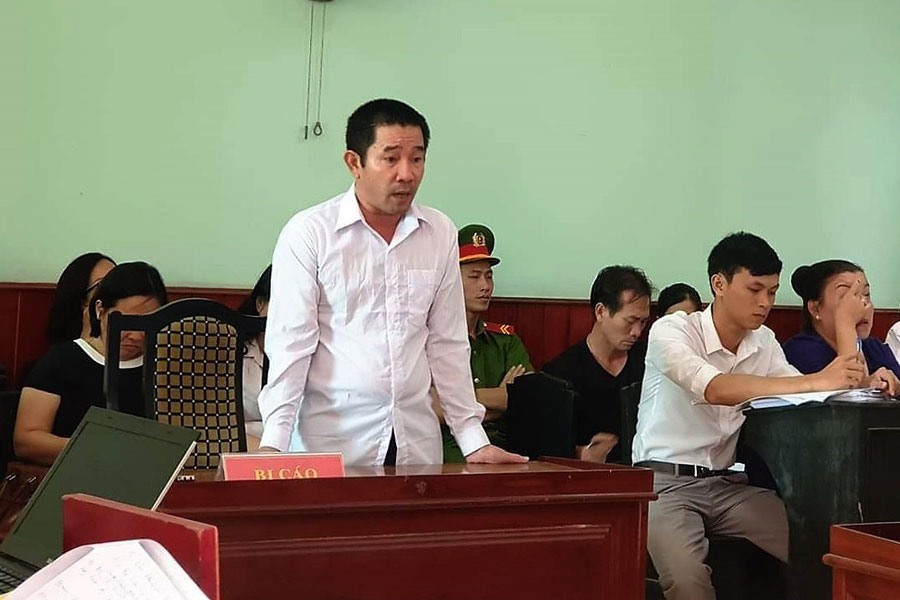 Nguyên chấp hành viên Nguyễn Văn Chánh tại phiên tòa sơ thẩm. Ảnh: P.V