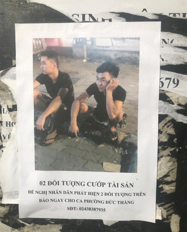 Tờ rơi công an dán chụp lại ảnh 2 đối tượng nghi sát hại cướp tài sản của nam sinh Nguyễn Cao S.