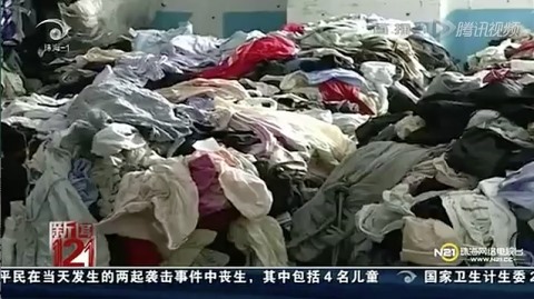 Chất thải may mặc ở Trung Quốc. Ảnh chụp màn hình/Thời báo Đại Kỷ Nguyên