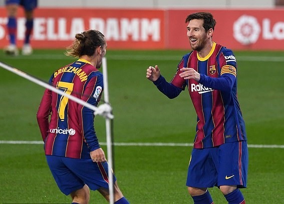 Messi vào sân ở hiệp 2, giúp Griezmann ghi bàn và tự mình lập cú đúp. Ảnh: AFP