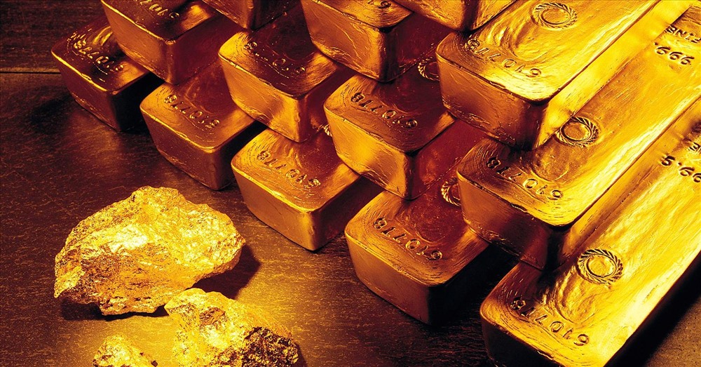 Giá vàng hôm nay đồng loạt điều chỉnh giảm ở thị trường trong nước và thế giới. Ảnh TL