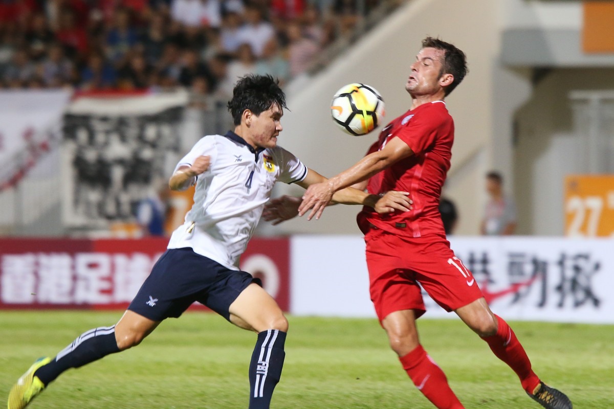 Trận giao hữu Lào vs Hong Kong cuối năm 2017 khiến 2 cầu thủ dính chàm. Ảnh: SCMP.