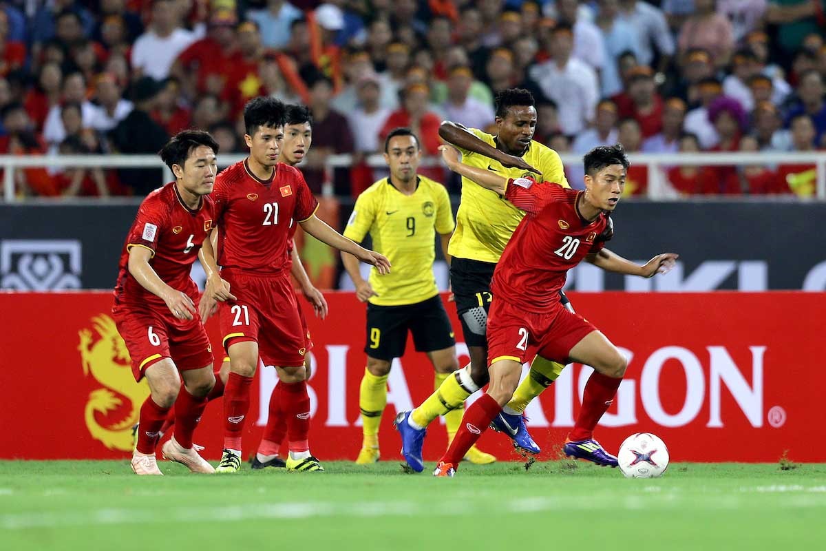 Trận đấu tranh ngôi đầu bảng G giữa tuyển Việt Nam và Malaysia cuối tháng 3 đứng trước nguy cơ phải tạm hoãn. Ảnh: AFF