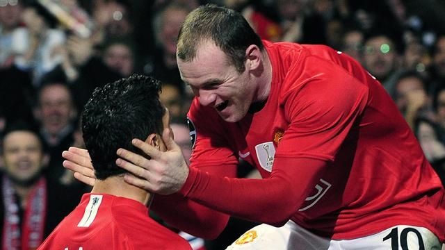 Rooney ăn mừng chiến thắng trước Inter Milan ở vòng 16 đội trong khuôn khổ Champions League mùa giải 2009.