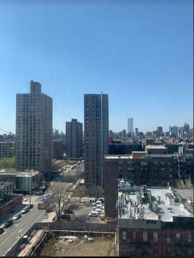 Nhìn từ trên cao, thành phố New York bình yên như trong một giấc ngủ dài (ảnh Kate Nguyen)