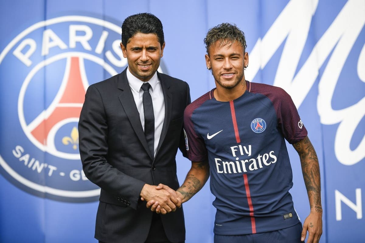 Nasser Al-Khelaifi và Neymar. Ảnh: Getty.