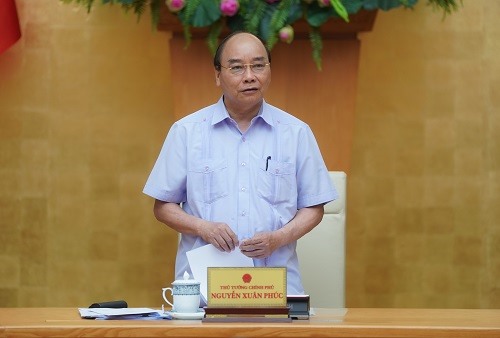 Thủ tướng Nguyễn Xuân Phúc chủ trì cuộc họp - Ảnh: VGP/Quang Hiếu