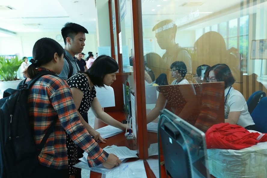 Các DN không thực hiện nộp số tiền nợ gốc, thì tiền phạt chậm nộp sẽ tiếp tục tăng lên. Ảnh Hải Nguyễn (minh họa).