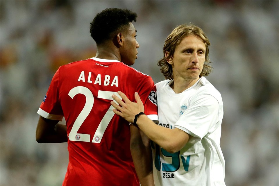 Alaba sẽ trở thành đồng đội với Luka Modric ở mùa giải 2021-22. Ảnh: AFP