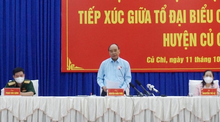Chủ tịch nước Nguyễn Xuân Phúc phát biểu tại buổi tiếp xúc cử tri huyện Củ Chi, TPHCM. Ảnh: Minh Quân