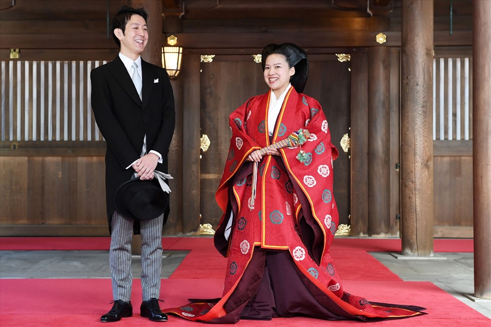 Công chúa Nhật Bản Ayako - con gái thứ ba của cố Thân vương Takamado - anh em họ của Nhật hoàng Akihito làm đám cưới với thường dân năm 2018. Chú rể là Kei Moriya, nhân viên của công ty vận chuyển Nippon Yusen. Ảnh: AFP