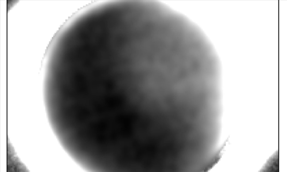 Ảnh mặt tối của sao Diêm Vương vừa được NASA công bố. Ảnh: NASA