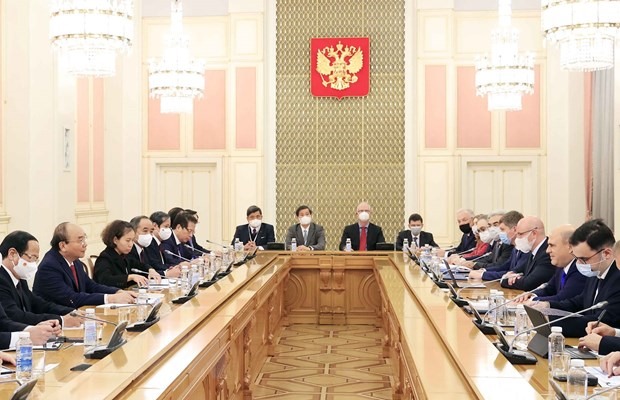 Quang cảnh cuộc hội kiến giữa Chủ tịch nước Nguyễn Xuân Phúc với Thủ tướng Nga Mikhail Mishustin tại Mátxcơva. Ảnh: TTXVN