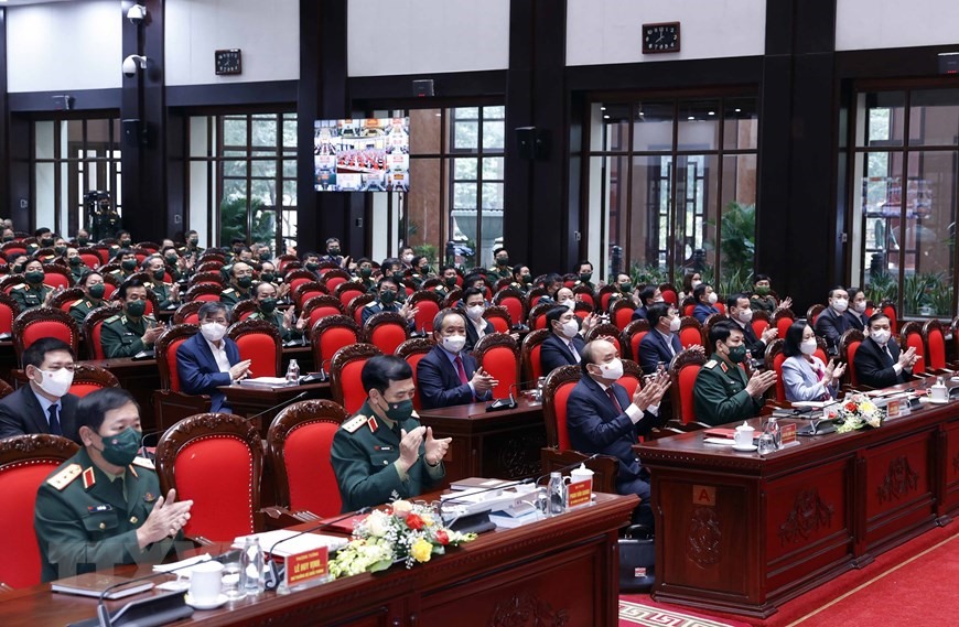Chủ tịch nước Nguyễn Xuân Phúc dự Hội nghị Quân chính toàn quân năm 2021. Ảnh: Thống Nhất
