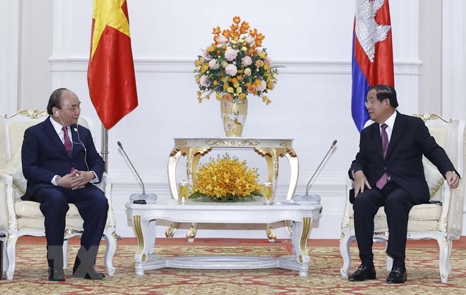 Chủ tịch nước Nguyễn Xuân Phúc và Thủ tướng Campuchia Hun Sen. Ảnh: TTXVN