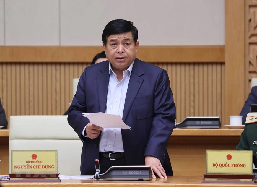 Bộ trưởng Bộ Kế hoạch và Đầu tư Nguyễn Chí Dũng phát biểu tại phiên họp. Ảnh: Thống Nhất/TTXVN