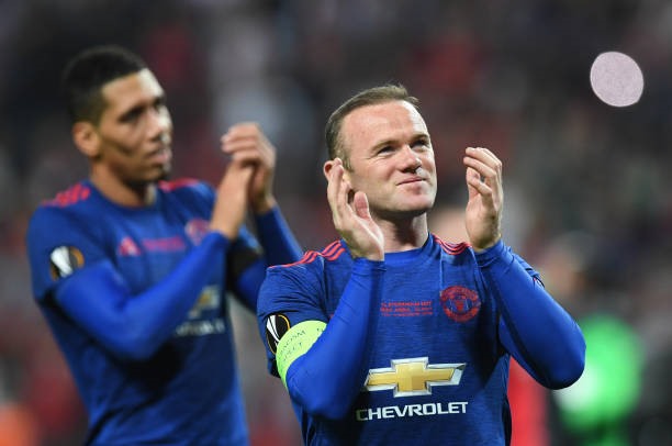 Rooney là mẫu cầu thủ biết hi sinh vì đội bóng. Ảnh: AFP