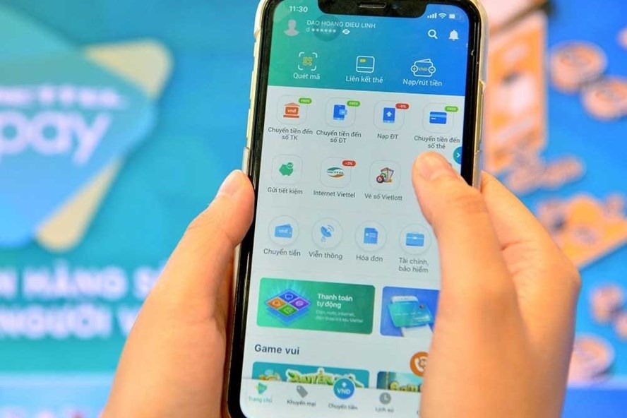 Việc triển khai thí điểm Mobile Money là cơ sở quan trọng để thúc đẩy thanh toán không dùng tiền mặt ở Việt Nam. Ảnh VT