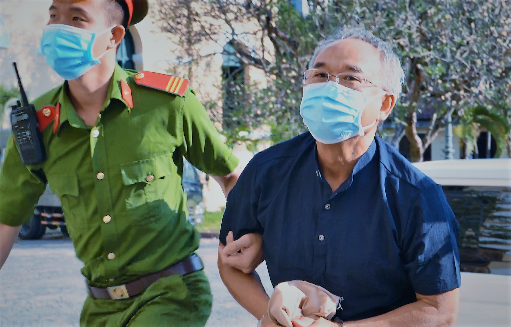 Bị cáo Nguyễn Thành Tài được đưa đến phiên tòa sáng 22.3. Ảnh: Anh Tú