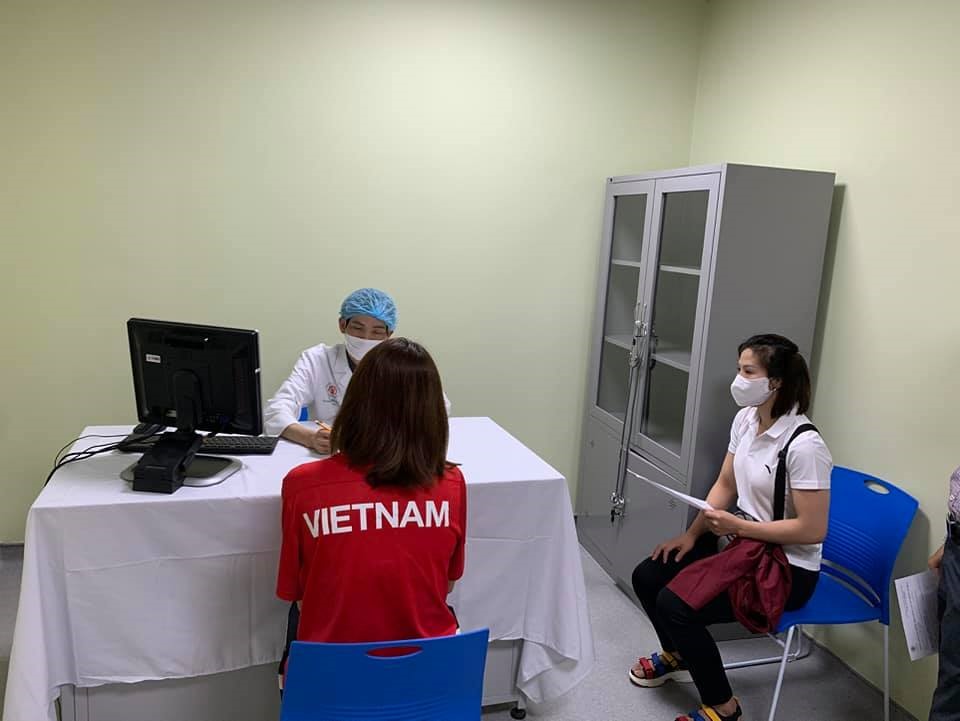Các vận động viên Việt Nam đầu tiên tiêm vaccine COVID-19. Ảnh: T.S