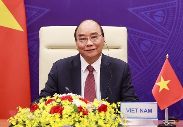 Chủ tịch Nước Nguyễn Xuân Phúc tại điểm cầu Hà Nội. Ảnh: TTXVN