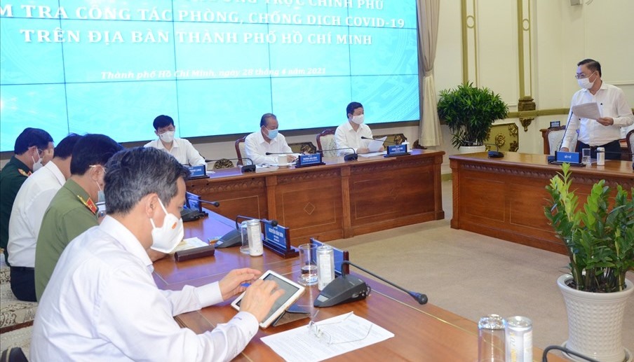 Phó Thủ tướng Thường trực Trương Hoà Bình chủ trì buổi làm việc tại TPHCM. Ảnh: Huyên Nguyễn