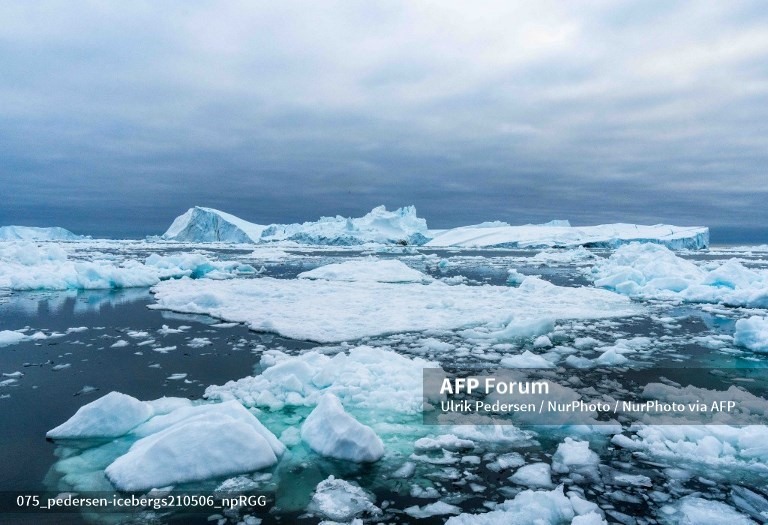 Biến đổi khí hậu đang ảnh hưởng sâu sắc đến Ilulissat, Greenland với các sông băng và chỏm băng đang rút đi. Ảnh: AFP