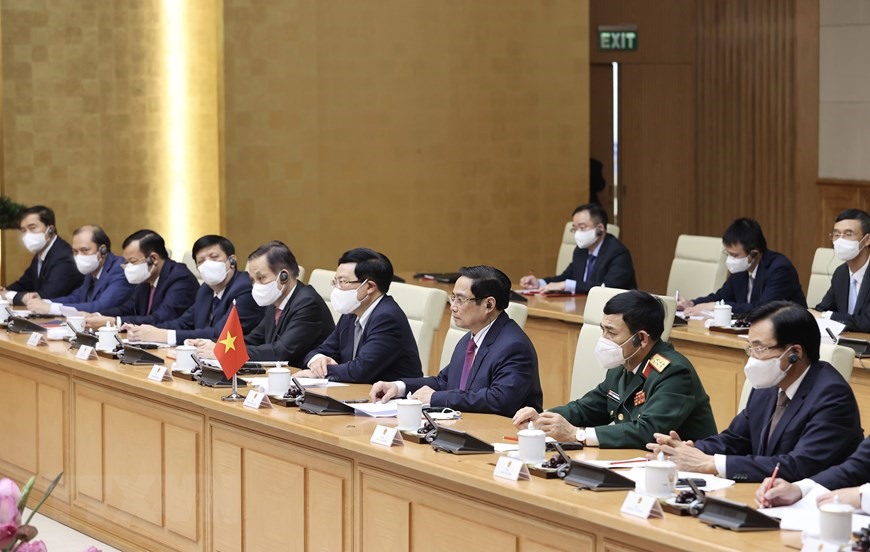 Thủ tướng Phạm Minh Chính và các thành viên Chính phủ tại buổi hội kiến. Ảnh: TTXVN