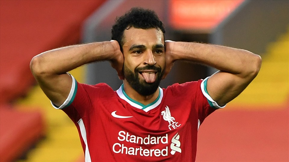 Không còn tin đồn nào bên tai Salah nữa. Ảnh: Premier League.