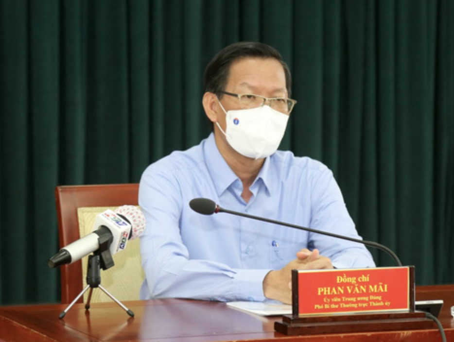 Phó Bí thư Phan Văn Mãi cho biết thành phố có thể giới hạn quy định sau 18h sẽ có những công việc, nhiệm vụ không được ra đường. Ảnh” TTBC
