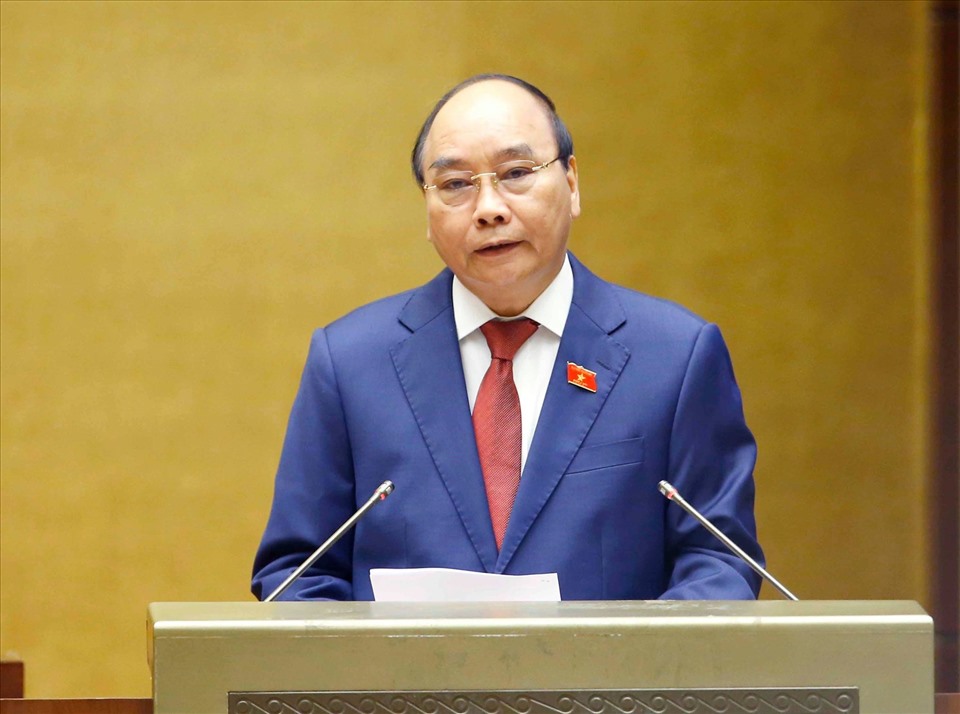 Chủ tịch nước Nguyễn Xuân Phúc phát biểu trước Quốc hội. Ảnh Doãn Tuấn