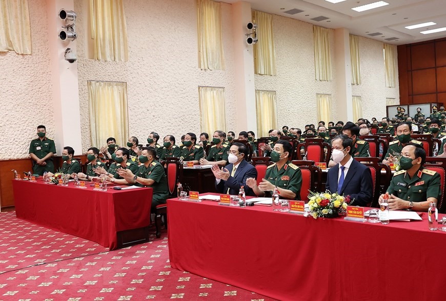 Thủ tướng Phạm Minh Chính và các đại biểu dự Lễ khai giảng năm học 2021-2022 của Học viện Quốc phòng. Ảnh: Dương Giang/TTXVN