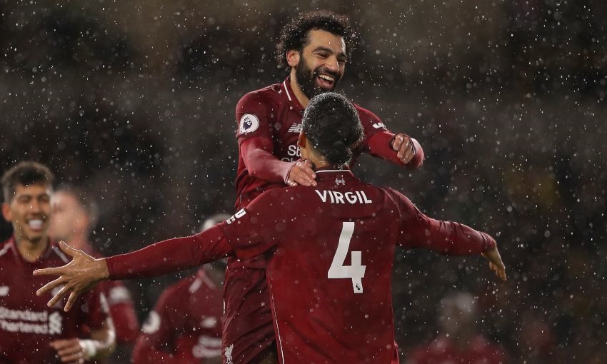 Nếu Liverpool đồng ý, Salah sẽ vượt Virgil van Dijk ở Liverpool và cả Cristiano Ronaldo để trở thành cầu thủ nhận lương cao nhất Premier League. Ảnh: AFP