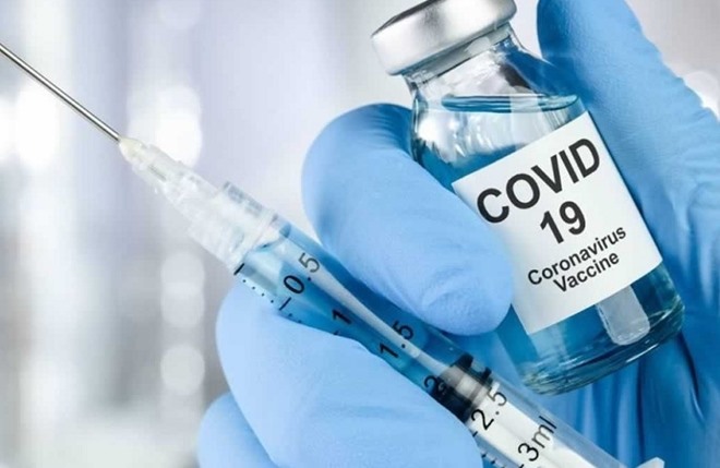 Bộ Tài chính cho biết hiện Quỹ vắc-xin phòng COVID-19 đã huy động được trên 8.600 tỉ đồng. Ảnh TL