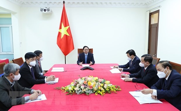 Thủ tướng Phạm Minh Chính điện đàm với Thủ tướng Trung Quốc Lý Khắc Cường ngày 13.1. Ảnh: TTXVN