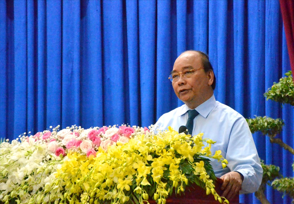 Chủ tịch Nước Nguyễn Xuân Phúc phát biểu tại lễ tặng quà Tết. Ảnh: LT