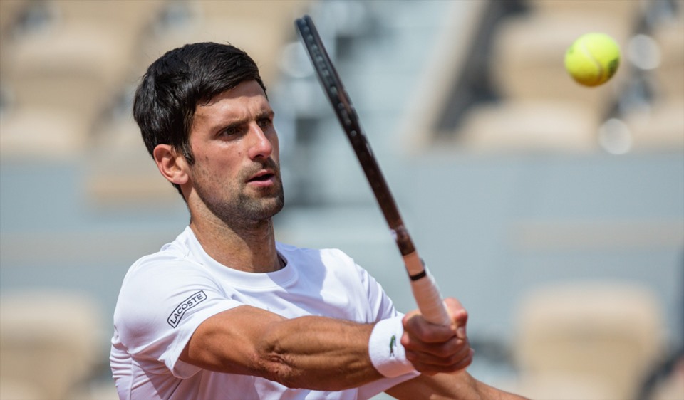 Vị trí số 1 của Novak Djokovic chưa bị đe dọa dù không thi đấu tại Australian Open 2022. Ảnh: AFP