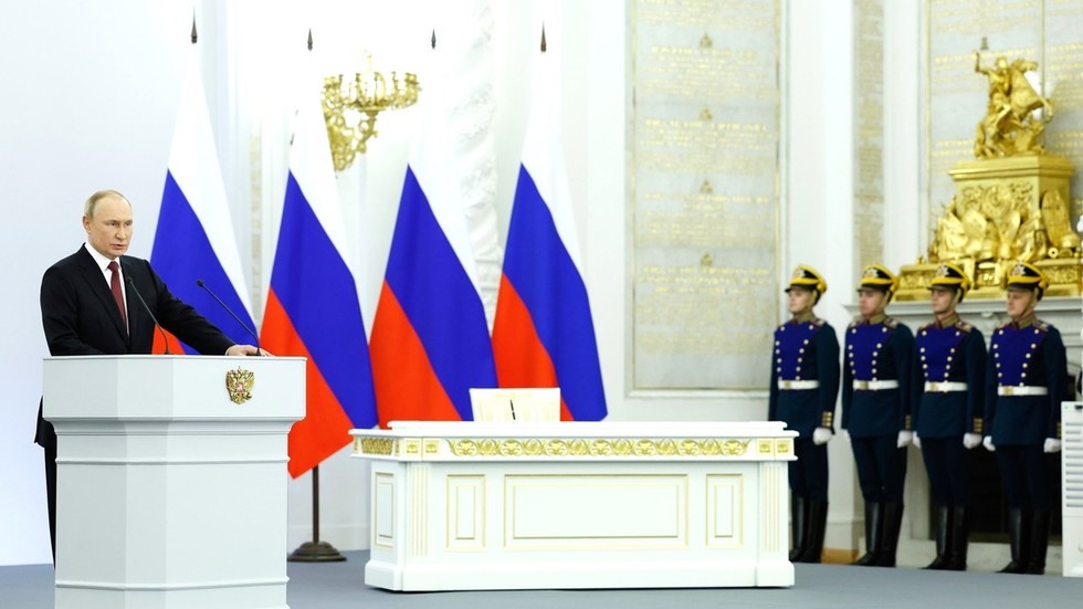 Tổng thống Nga Vladimir Putin tuyên bố sáp nhập 4 vùng lãnh thổ Ukraina trong sự kiện ở Điện Kremlin ngày 30.9. Ảnh chụp màn hình
