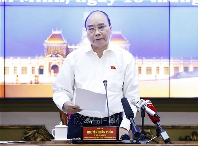 Chủ tịch nước Nguyễn Xuân Phúc phát biểu tại buổi làm việc với TPHCM.  Ảnh: TTXVN