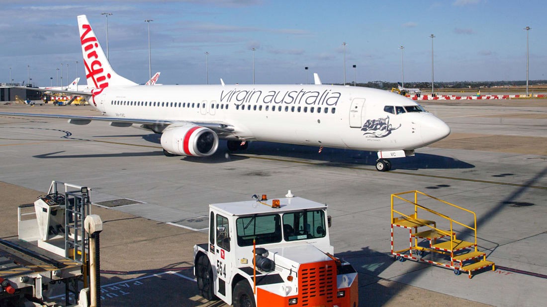 Hành khách ngồi ghế giữa của chuyến bay thuộc hãng hàng không Virgin Australia sẽ nhận được giải xổ số khủng. Ảnh: CNN
