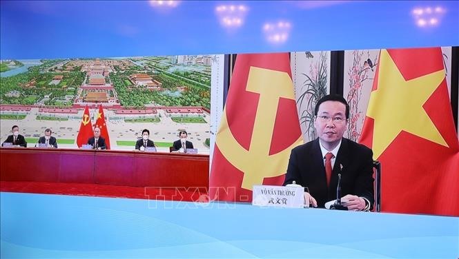 Cuộc hội đàm giữa Thường trực Ban Bí thư Võ Văn Thưởng với Ủy viên Thường vụ Bộ Chính trị Đảng Cộng sản Trung Quốc Thái Kỳ diễn ra theo hình thức trực tuyến. Ảnh: TTXVN