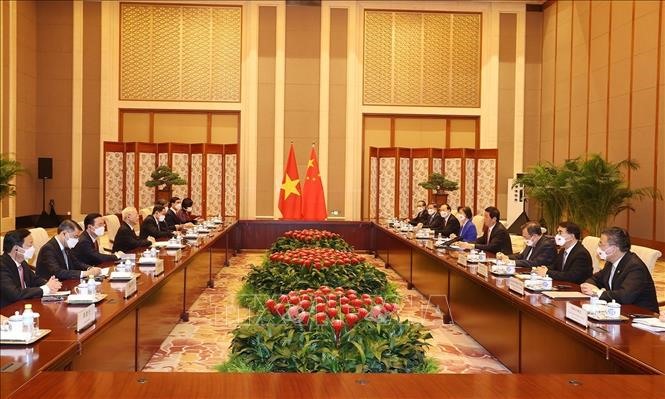 Quang cảnh cuộc hội kiến giữa Tổng Bí thư Nguyễn Phú Trọng và Chủ tịch Quốc hội Trung Quốc. Ảnh: TTXVN