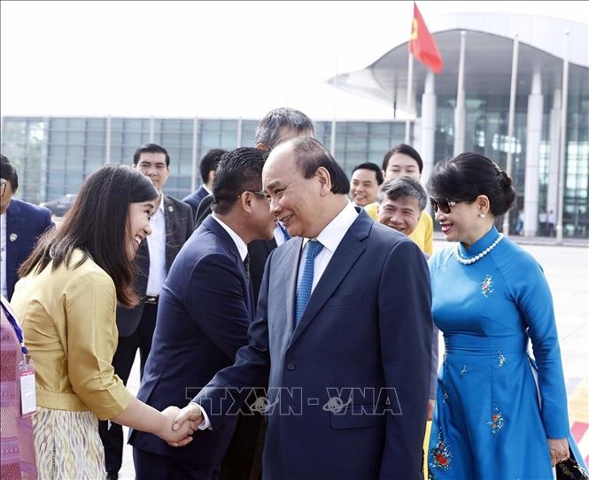 Lễ tiễn Chủ tịch nước Nguyễn Xuân Phúc và Phu nhân tại sân bay Quốc tế Nội Bài. Ảnh: TTXVN